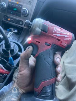 Milwaukee 12v fuel surge impact and 4.0ah battery