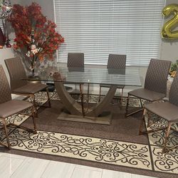 Dining Table with 6 chairs and carpet
