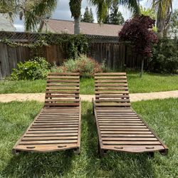 2 teak outdoor chaise loungers 