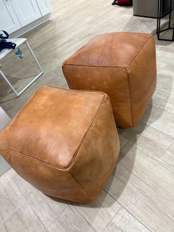 Tan Leather Ottoman Poufs – Set of 2