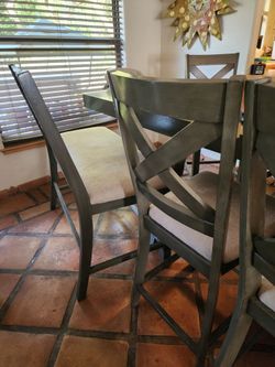 95 inch table with 6 chairs and a bench.
