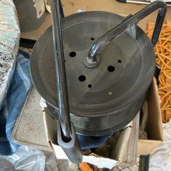 Plastic Spool With Metal Fixtures, Approximately 10 Inches In Diameter