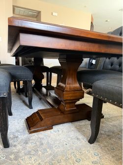 Dark brown wood dining table