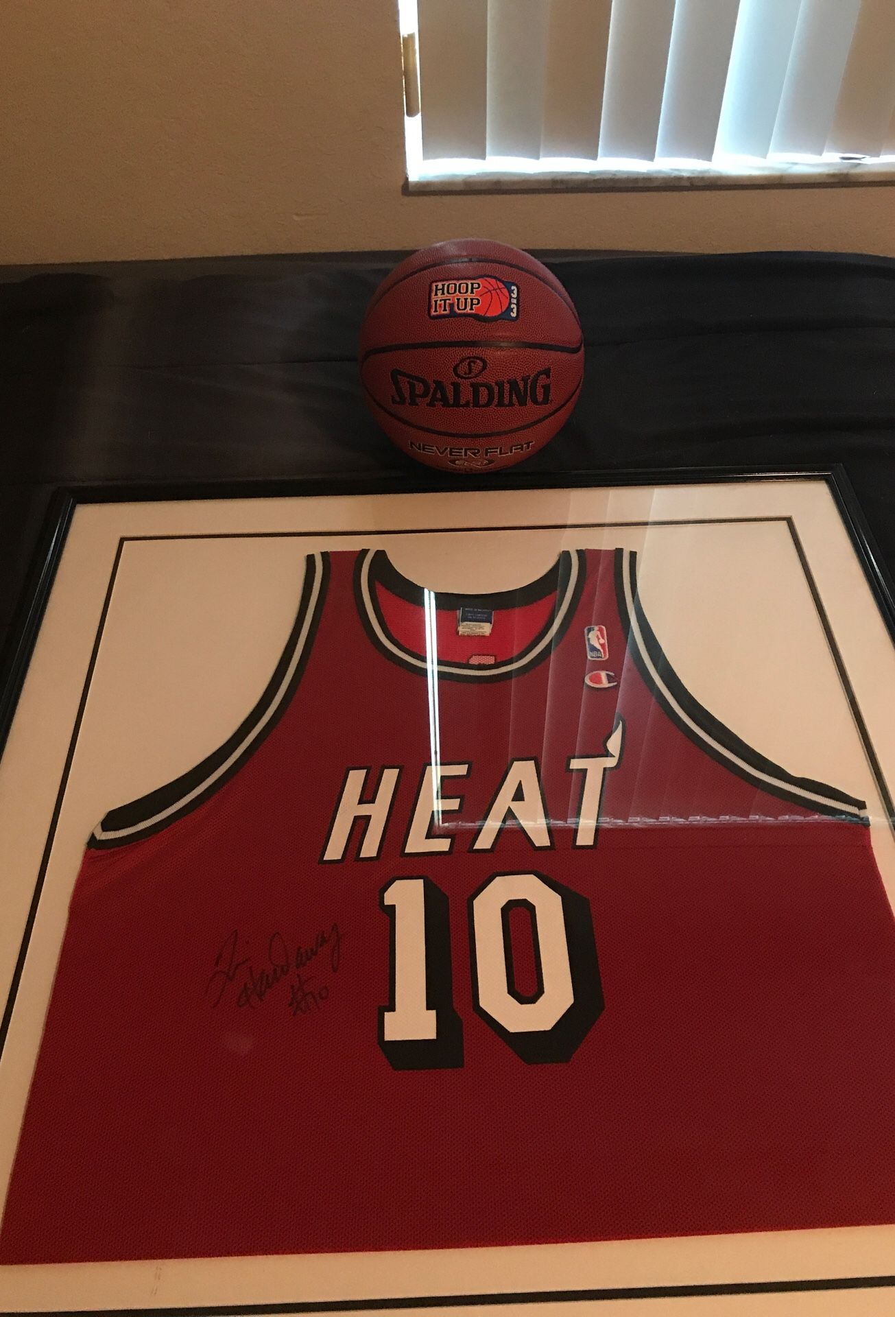 Autographed “Tim Hardaway” Heat Jersey