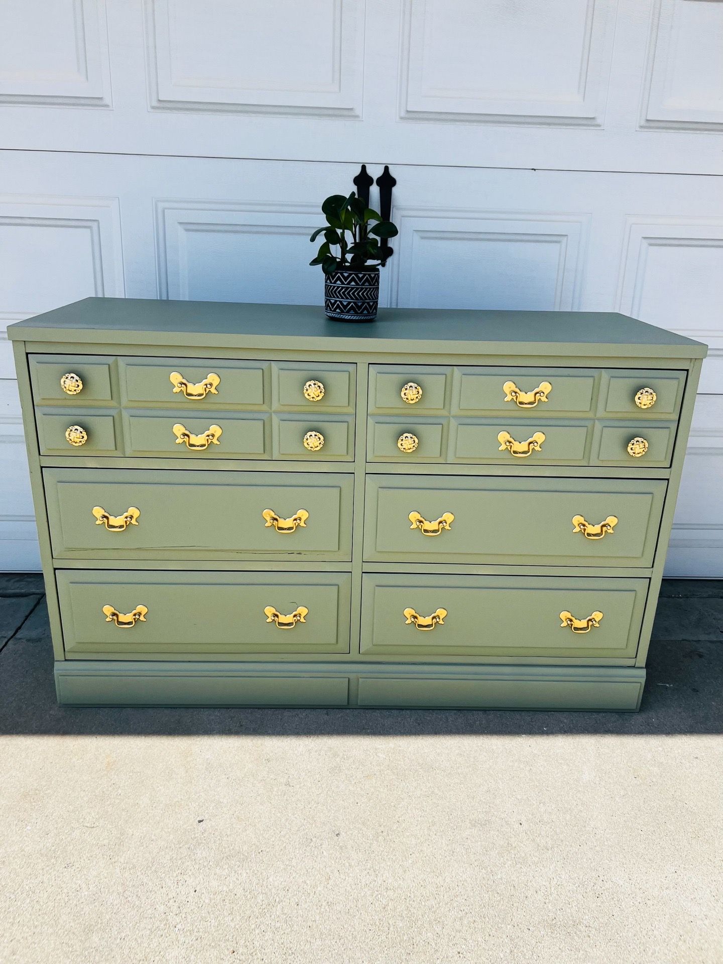 Sage green dresser with gold hardware
