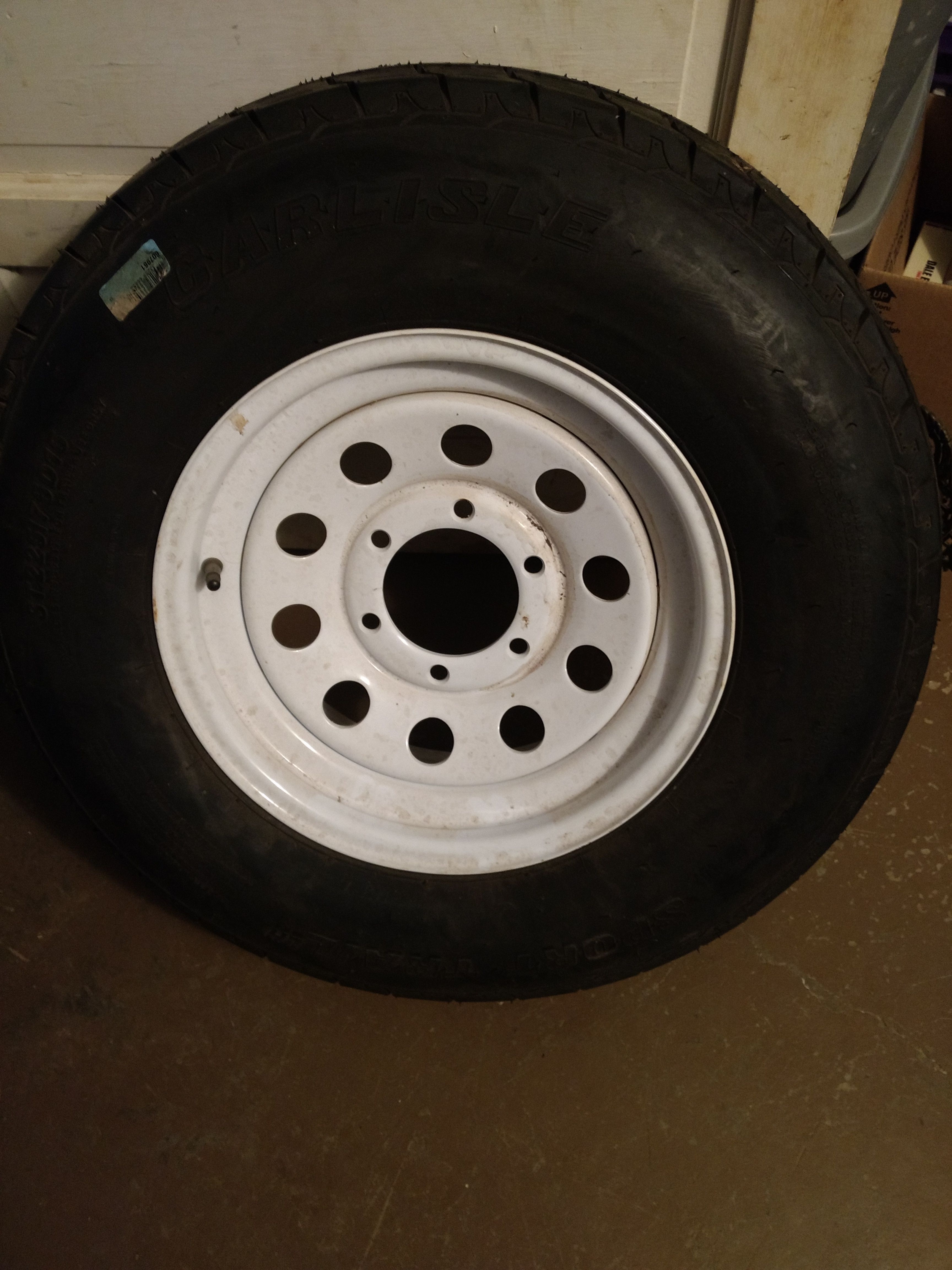 Carlisle sports trailer st225/75D15 4 play 6 lug center 4 in. Trailer tire brand new never been on trailer $100.00 no holds must pick up