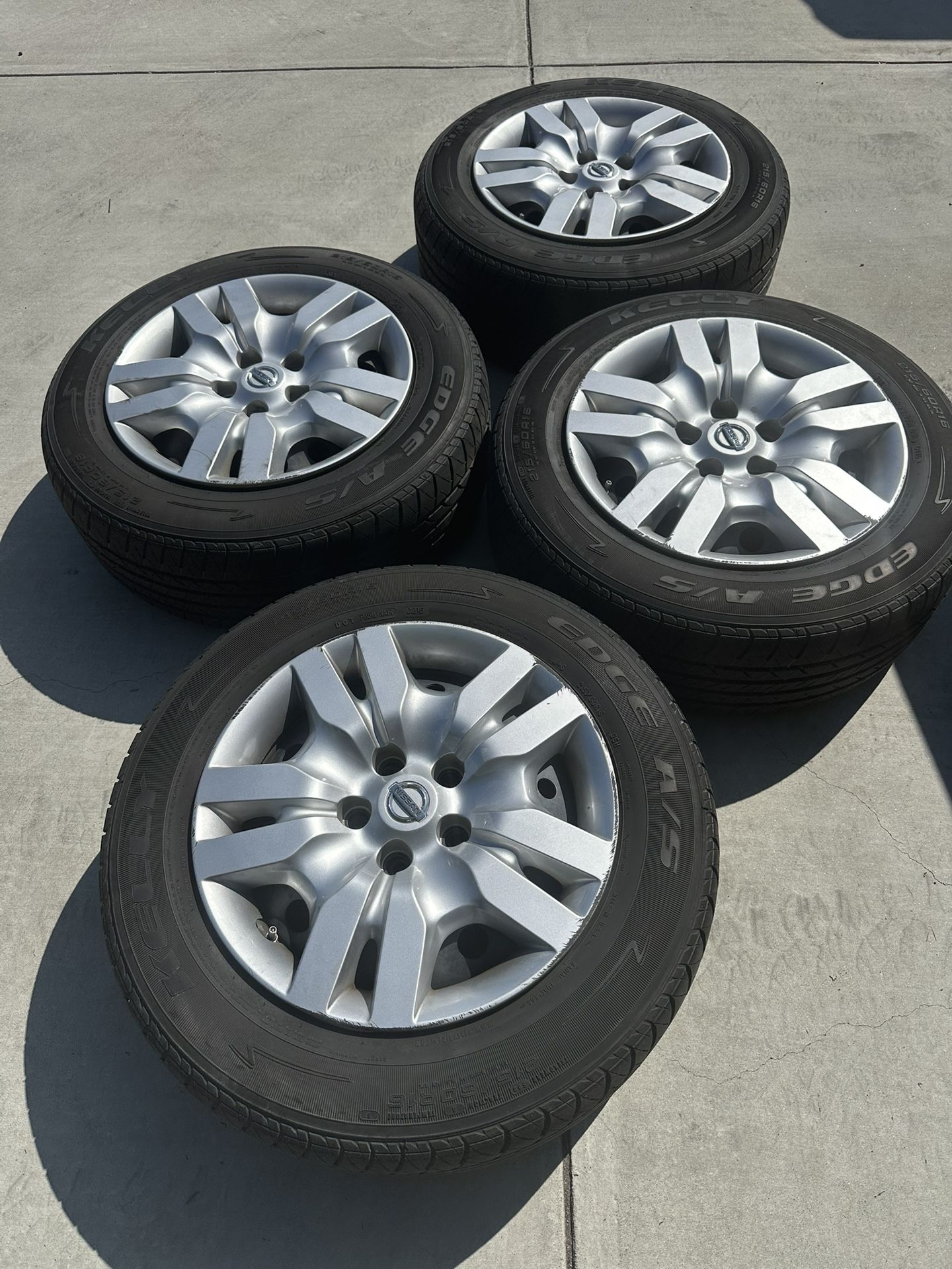 Nissan Altima OEM Wheels. Hub Caps, Tires And TPMS Sensors
