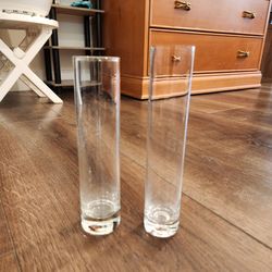 2 clear glass cylinder bud vases, 7.5" & 8" tall, good condition