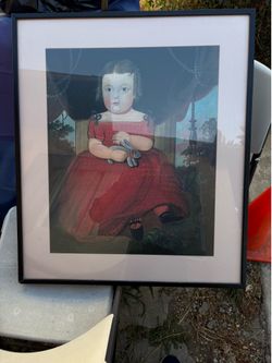 Picture frame of a doll