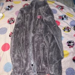 Gray fuzzy north face zip up