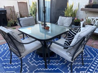 5 piece metal/glass patio set- table & chairs