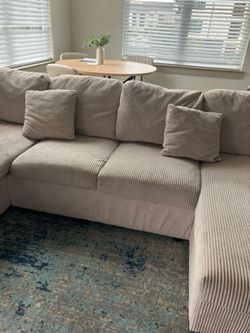 Beige sectional couch