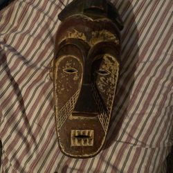 hand-carved Bembe mask from the Democratic Republic of the Congo. 