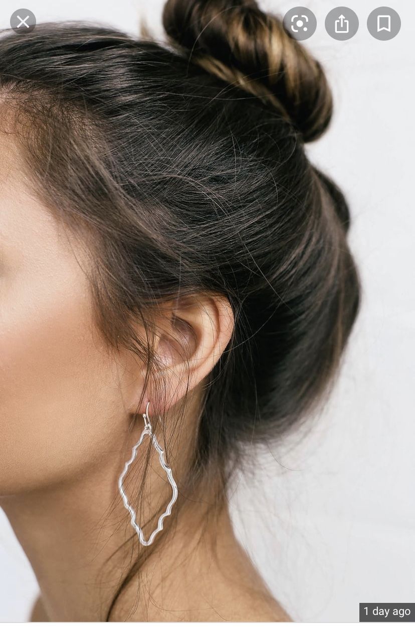 Lulu’s silver earrings