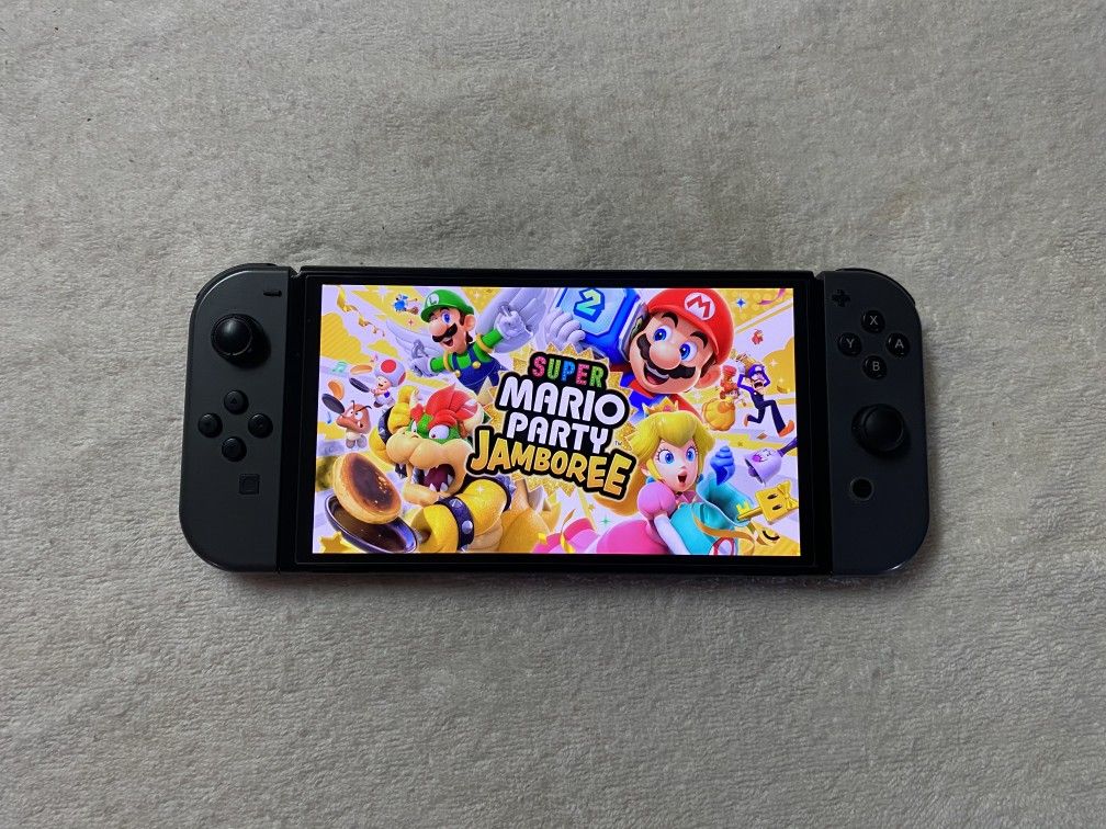 SWITCH OLED with 100 POPULAR SWITCH GAMES