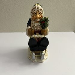 David Frykman Santa on Sled figurine. 