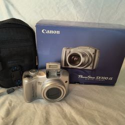 Canon PowerShot SX100 Digital Camera With 10X Zoom