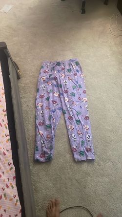 Set of 7 Christmas themed pajama pants.