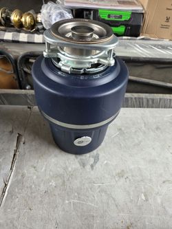 New InSinkErator Evolution SpaceSaver 5/8 HP Continuous Feed garbage disposer. Retails $195 with Taxes!
