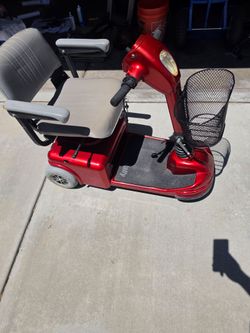 Red Electric Mobility Scooter with Basket