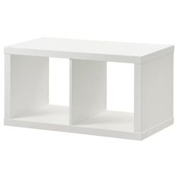 3 white ikea kallax shelves