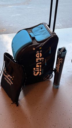 Slinger tennis ball machine