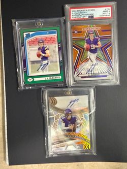 JJ McCarthy autographed cards numbered