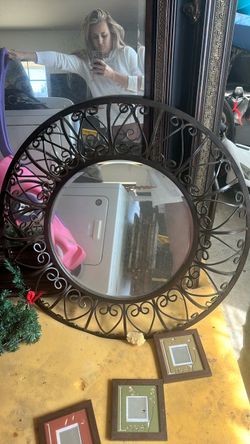 Dark brown metal mirror