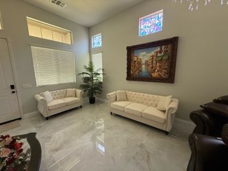 Beige velvet sofa