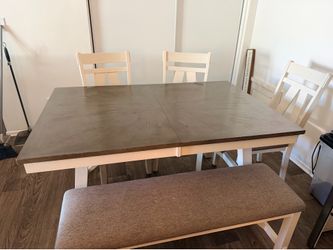 Dining table with chairs and bench