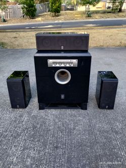 Yamaha surround sound speakers with subwoofer.