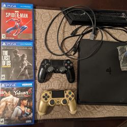 PlayStation 4 Complete With Cables 2 Controllers And 3 Games