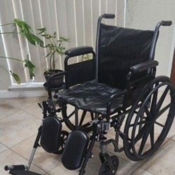 Wheelchair With Elevated Foot Rest 
