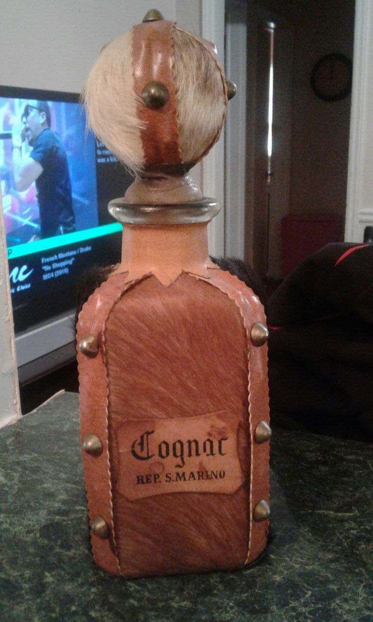 Vintage leather cognac bottle from rep. San marino