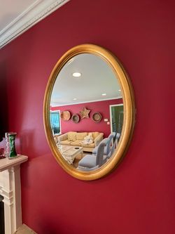 Gold Beveled Oval Mirror 23” x 30” Smoke and pet free household.