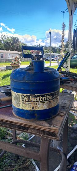 Metal container. 2 gallons.