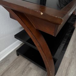 Wood TV stand with glass shelves