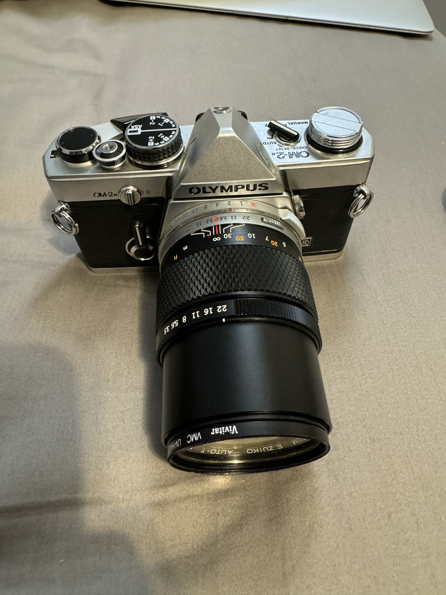 Olympus OM-2N SLR film camera with 135mm F/3.5 Lens