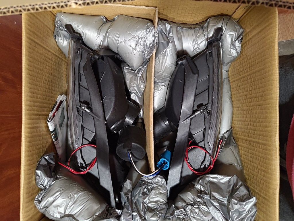 Brand New Anzo USA Dodge Headlights.