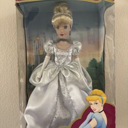 Brass Key Collectibles Disney Princess Cinderella Porcelain Keepsake Doll, specifically the Holiday Jewels Edition.