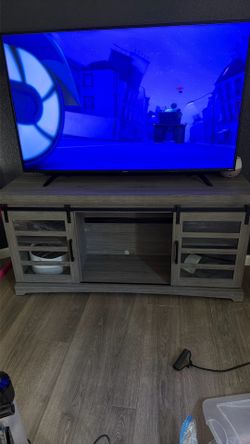 Entertainment center with charging ports