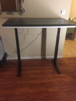 Electric hide adjustable table
