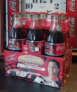 Coca-Cola racing family. Coke bottles. Tony Stewart Championship Coke bottles. Six pack