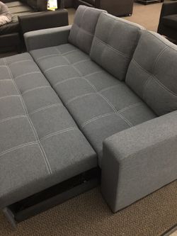 Comoact convertible sofa. Brand new!!