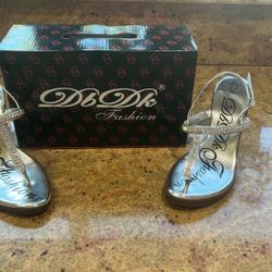 Elegant silver wedged sandals