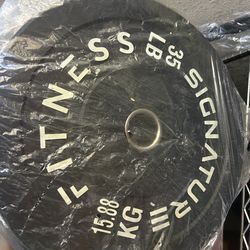 New pair of long 35 pounds bumper weights