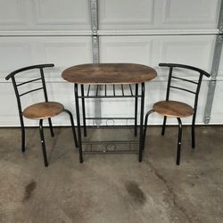 Wood And Metal Dining Table And Two Chairs