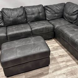 Leather sectional sofa couch and ottoman 
