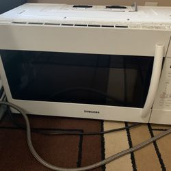 Samsung 1.9 cu.ft Over-the-Range Microwave Oven. In good shape. See description for more info.