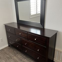 $250 Ashley Portdown 8 Drawer Dresser w/  Mirror and End Table